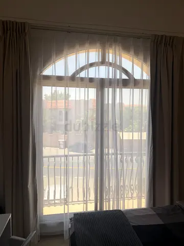 Beige curtains with sheer voile panels two layers  used for 6 months , good condition ,