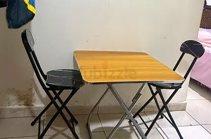 folding dining table with two folding chairs - light wood