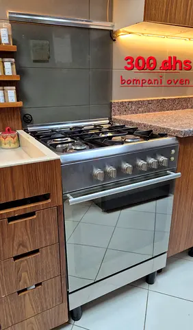 Bompani stainless steel gas range with oven - good condition