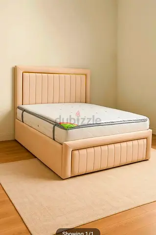 Brand New Queen size upholstered bed with mattress and storage base