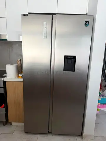 Hisense Stainless Steel Side-by-Side Refrigerator with Water Dispenser - Good Condition