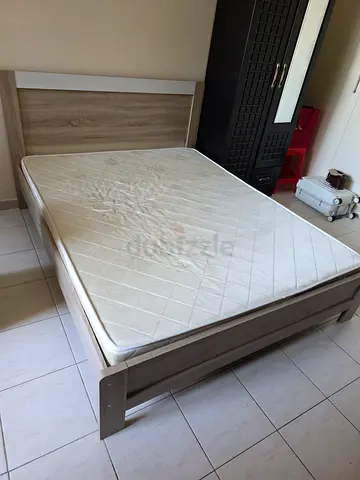 Queen bed frame with mattress - good condition