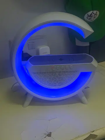 LED speaker with 50 color modes and can charge any phone and is Bluetooth and it has everything.