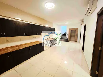 away from fly zone private entrance 3 bedroom with elevator villa all master/laundry&store room/shared swimming pool/barbeque/2 parking/rent in mirdif