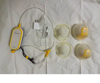 Dual pump medela breast pump