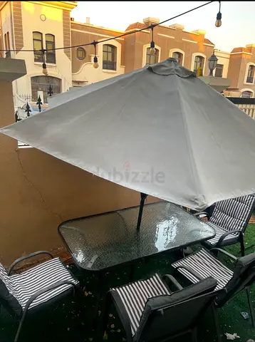 Outdoor patio dining set with umbrella - 4 chairs and table with cushion very comfortable
