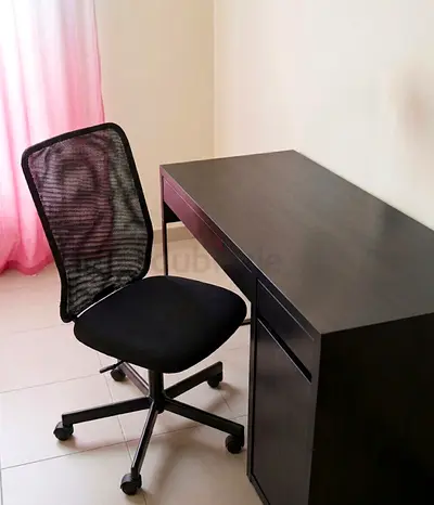 Black office desk with swivel mesh chair - good condition