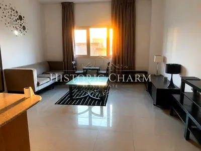 Furnished 1BR | Suburbia Tower 2 | Balcony with Garden View