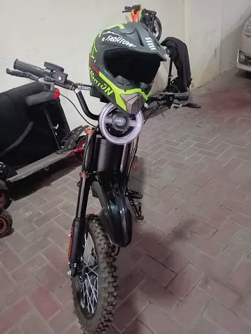 Kids Electric  Bike with Helmet - Good as new I only use twice,still in good condition as brand new