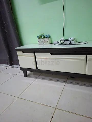Small modern TV stand / entertainment unit in dark wood and cream/Extendable