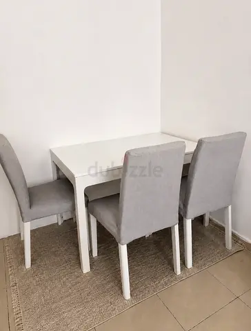 Urgent Sale: Extendable Dining Table with 5 Chairs
