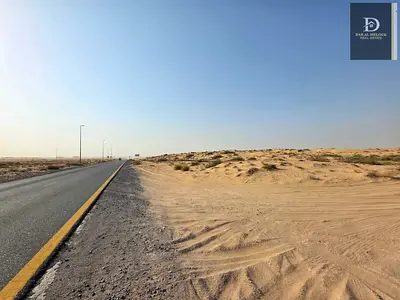 للبيع أرض تجارية في السحمه على شارع خورفكان مباشرة