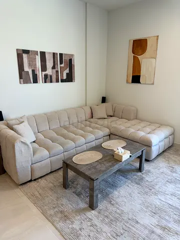 Large Beige L-shaped Sectional Sofa Bed — Converts to Spacious Bed