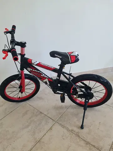 16 inches Shengoi Kids Bicycle in Red and Black (back wheel inner tube is leaking)
