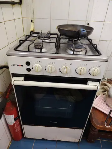 Used 4-Burner Gas Cooker with Oven - Good Working Condition with automatic switch button fire