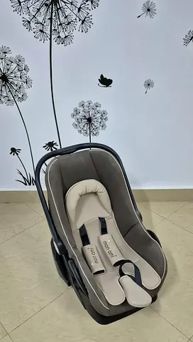 Reduced price. Mon Ami Infant car seat / carrier - New. Not used.