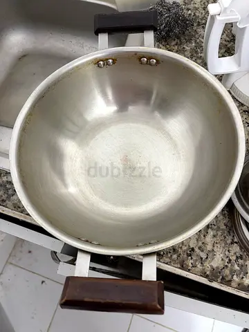 Used aluminum cooking pot with handles — good condition