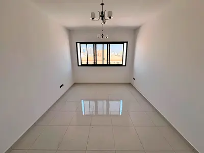 Apartment for rent in Al Jurf Three one bedroom hall first occupancy built in wardrobes central AC prime location easy access Dubai Sharjah