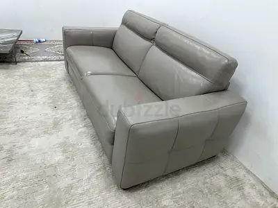 Looks great condition pure leather two seater sofabed