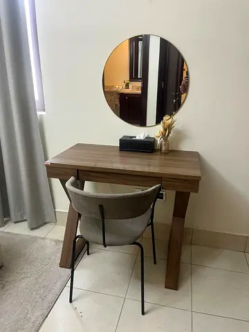 Compact wooden study desk with chair and round mirror
