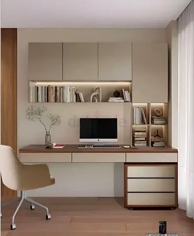 Built-in minimalist home office desk with overhead cabinets and drawers