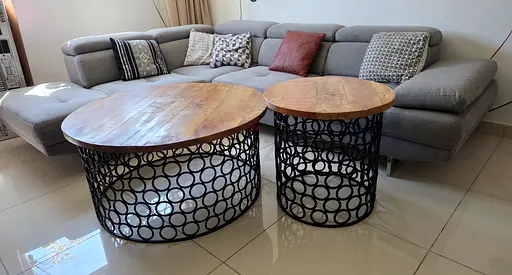 Set of 2 solid wood top coffee/corner tables with black metal circular base