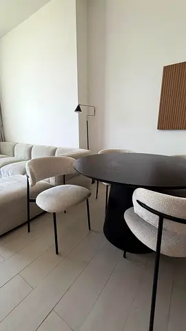 Round Black Oak-Style Pedestal Dining Table (4-Seater) with Bouclé Accent Dining Chairs FOR SALE