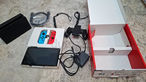 ​Nintendo Switch OLED (Neon Red/Blue) – Like New, Used 1 Month Only!