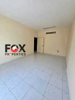 For annual rent in Al Hamidiya: a two-bedroom apartment with a living room, suitable for families, l
