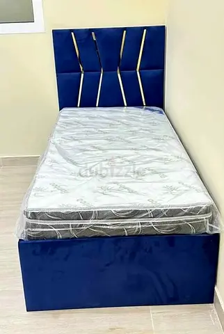 Single upholstered bed with headboard and mattress - navy blue