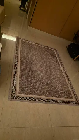 Used rectangular modern rug - neutral grey tones, good condition