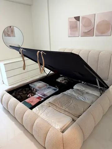 Beige fabric storage bed with lift-up storage - King