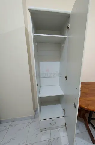 Slim white wardrobe/cupboard - single door with drawer (good condition)