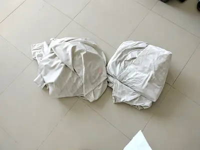 Pair of light grey curtains
