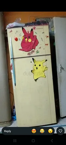 Used Top-Freezer Refrigerator with Cute Stickers — good Working Condition