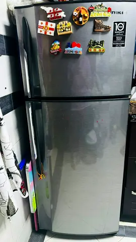 Used double-door refrigerator in good working condition