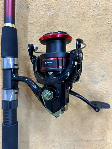 Spinning Fishing Reel on Rod - Good Working Condition