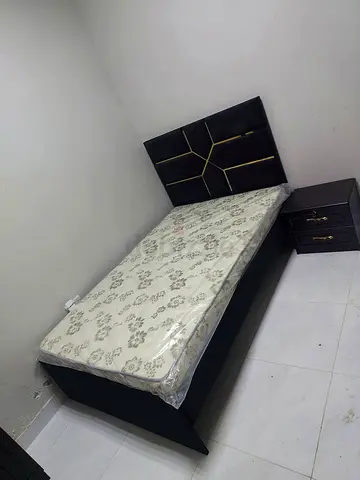 Brand New double bedwith mattress and bedside table -