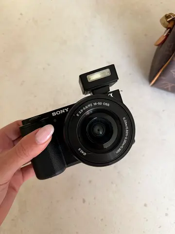 Sony ZV E-10  mirrorless camera (compact) with lens - used once. Like new