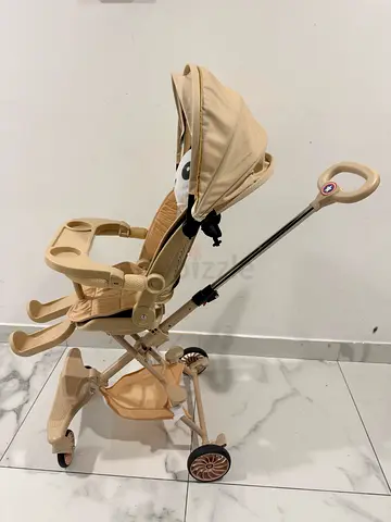 Lightweight baby stroller with push handle. And Baby Bouncer Rocker