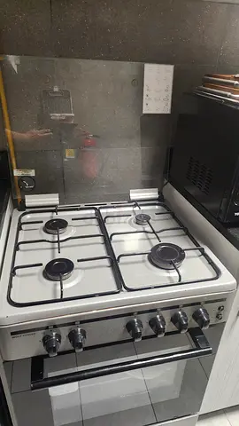Used 4-Burner Gas Stove with Oven - Good Working Condition