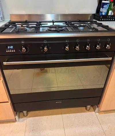 Smeg top gas oven electric 90x60cm black colour
