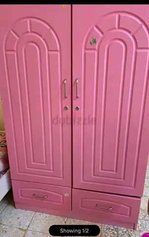 Charming Pink Wardrobe with Two Doors and spacious space inside.