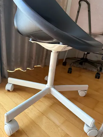 Simple IKEA white base office chair with grey/black plastic seat — good condition. Two available