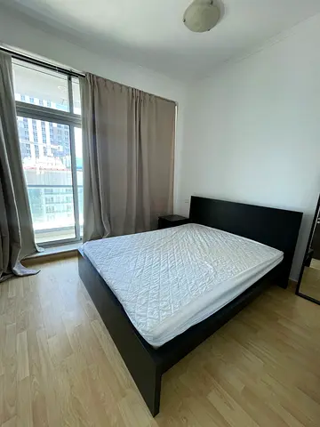 Queen bed frame with mattress - simple dark wood set