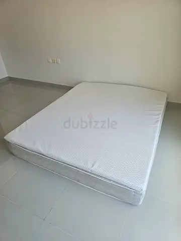 Used Queen Mattress in Good Condition - Clean, Firm Support with a brand new top mattress