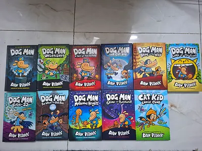 Lot of 12 Dog Man graphic novels by Dav Pilkey - complete set.