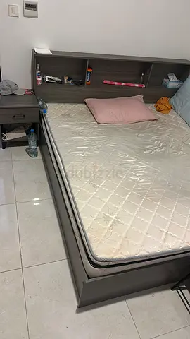 One bed and one bed frame with headboard storage and mattress - used