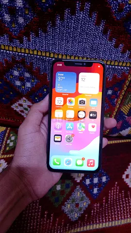 iPhone in good working condition — clean screen, unlocked