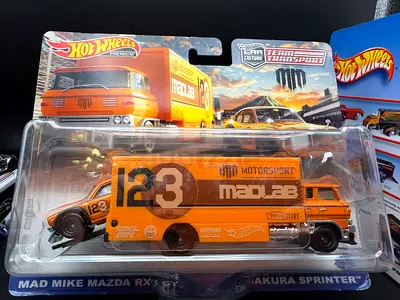 Hot Wheels Team Transport Mad Mike Mazda RX-3 with Sakura Sprinter Truck - New in Pack